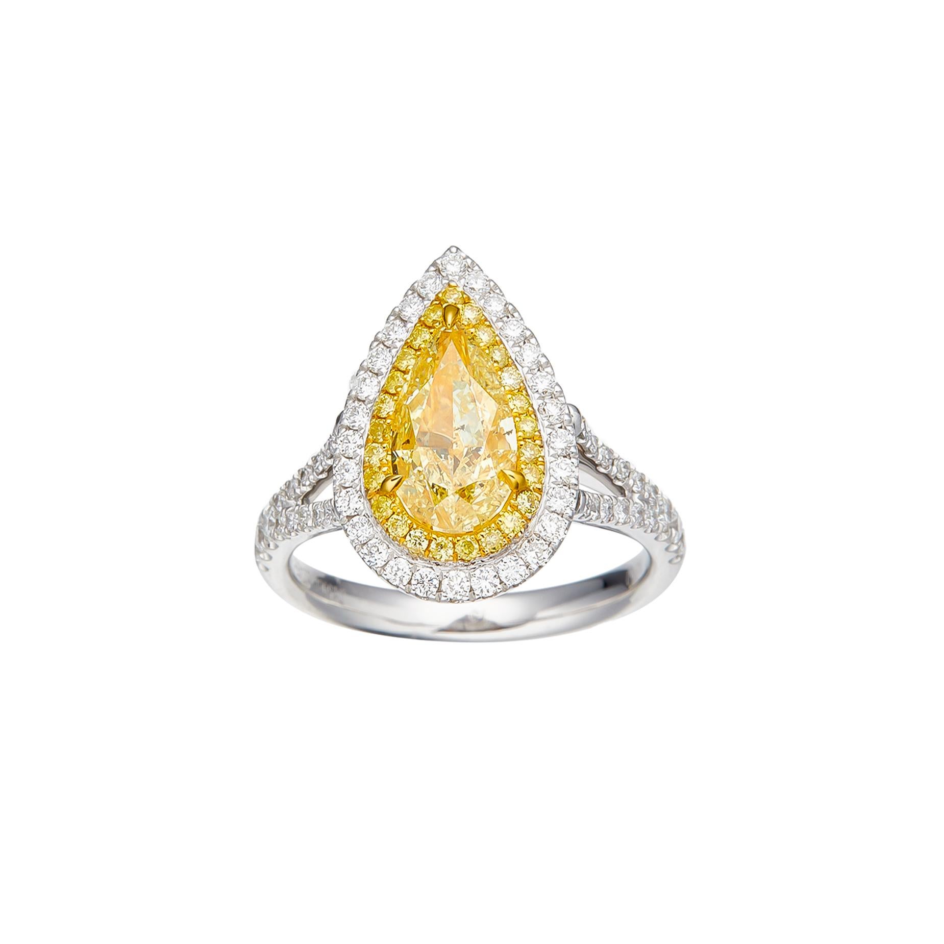 Introducing a true marvel of nature's elegance and versatility – a GIA Certified 1.50 carat W-X Range Natural Pear Shaped Diamond Solitaire Ring, delicately set in luxurious 18kt gold. This exquisite piece is not only a stunning representation of