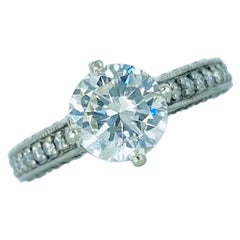 Anillo de compromiso con diamante central de 1,51 quilates certificado por el GIA