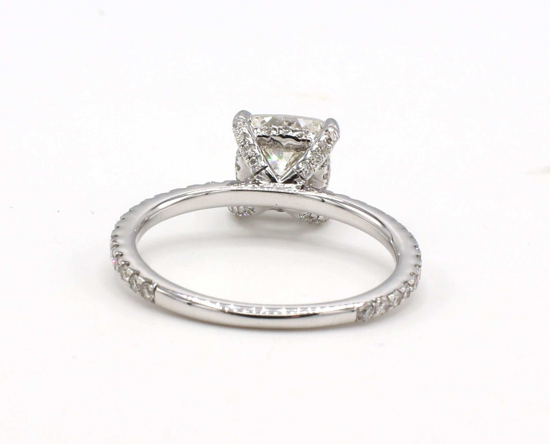 GIA Certified 1.51 Carat Cushion J SI2 Diamond Engagement Ring 
GIA report number: 1403482717
Metal: 18 Karat white gold
Weight: 2.48 grams
Diamond: 1.51 carat cushion J SI2 
Accent diamonds: Approx. .35 CTW G VS round diamonds
Size: 5.5