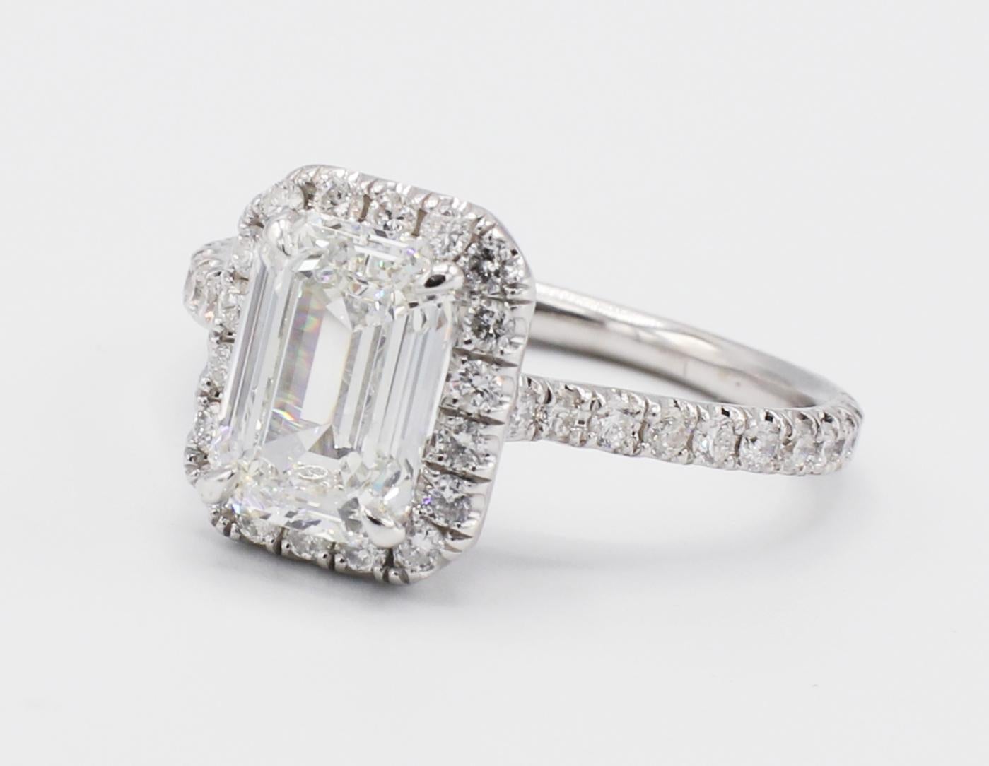 Modern GIA Certified 1.51 Carat Emerald Cut Diamond Halo Engagement Ring