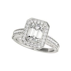 Bague à diamant en platine ajouré certifiée GIA de 1,51 carat avec halo d'émeraude gravé
