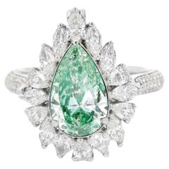 Anillo de diamantes verde amarillo tenue de 1,51 quilates y claridad SI2 certificado por el GIA