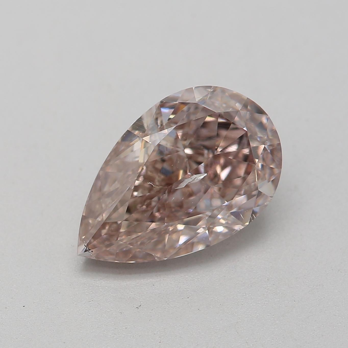 Certificate: GIA 
Report Number: 6217782325
Shape And Cut: Pear 
Carat Weight: 1.51 carat
Measurements: 9.40 x 6.02 x 3.31 mm
Color Grade: Fancy Pink Brown

FEATURES OF THE DIAMOND:

This Fancy Pink Brown diamond is a rare and distinctive diamond