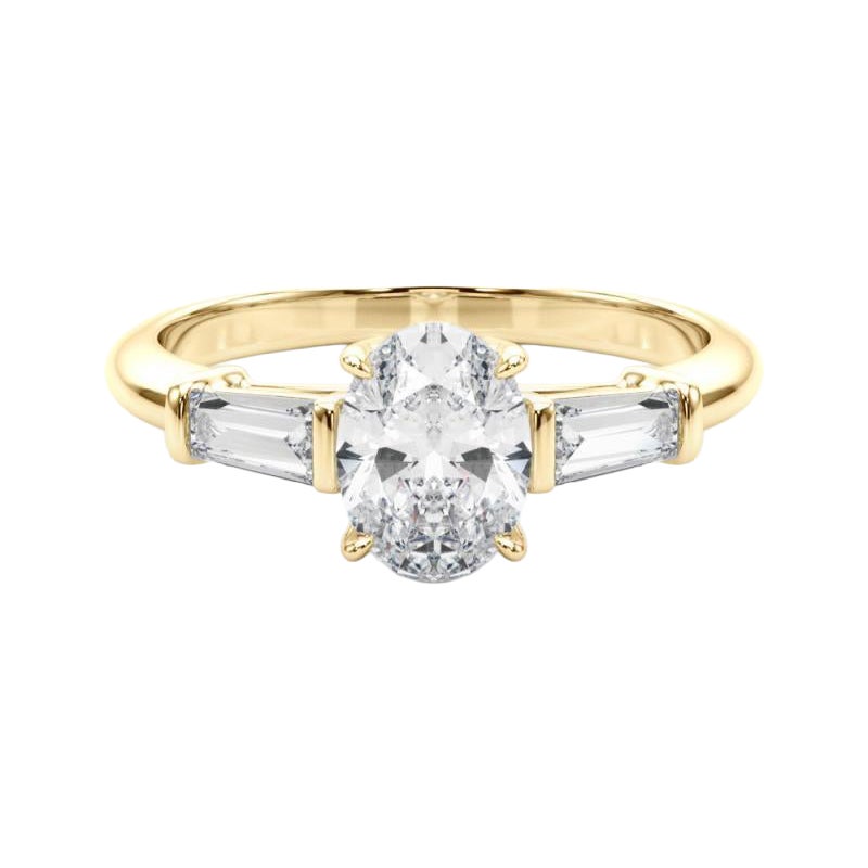 Bague à trois pierres en diamant ovale et baguette de 1,51 carat certifiée par le GIA