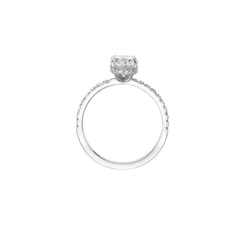 This incredible 1.51 ct oval cut diamond engagement ring will take your breath away!
The mesmerizing 1.01 ct oval cut center is GIA certified at D-SI2. Colorless and eye clean. Its wrapped with pave set diamonds underneath and floating atop a