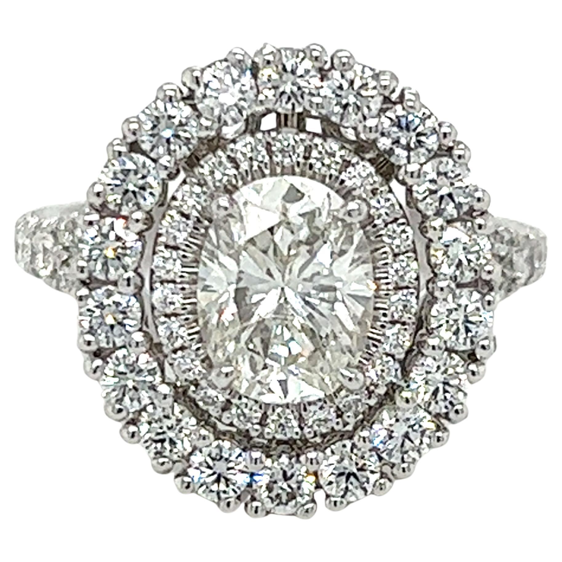 GIA Certified 1.51 Carat Oval Diamond Halo Engagement Ring  For Sale