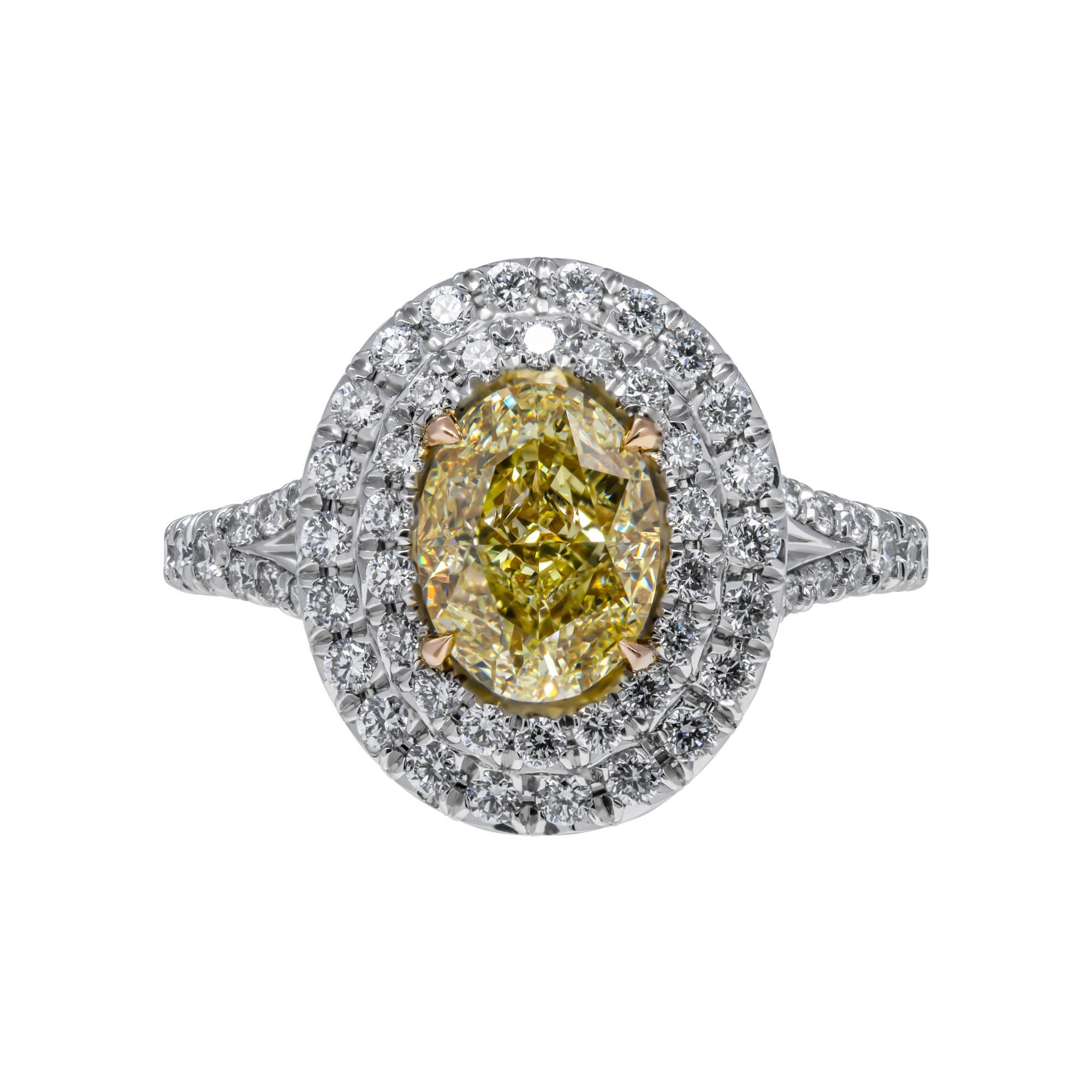 GIA Certified 1.51 Carat Oval Fancy Yellow Diamond Engagement Ring
Timeless Classic Oval Shape Diamond Engagement Ring - Timeless classis with a modern spin
Mounted in Platinum and 18K featuring exceptional pave work that compliments the center