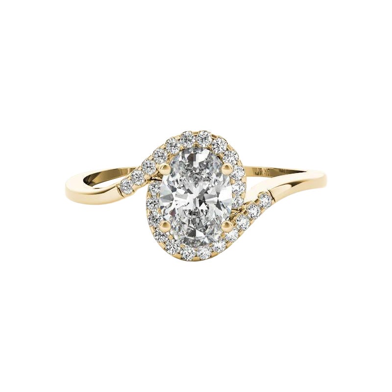 Anillo de diamantes con vástago de derivación curvado y halo oval de 1.51 quilates certificado por el GIA