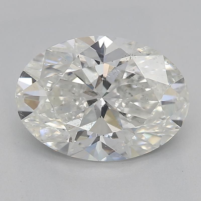 Dieser atemberaubende, in New York handgefertigte Diamantring zeigt in der Mitte einen ovalen Diamanten mit einem Gewicht von 1,51, der mit außergewöhnlicher Brillanz und Feuer strahlt. Dieser Diamant mit den Graden H und SI2 besticht durch sein