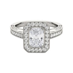 Anello con diamante radiante aureolato inciso e traforato certificato GIA da 1.51 carati