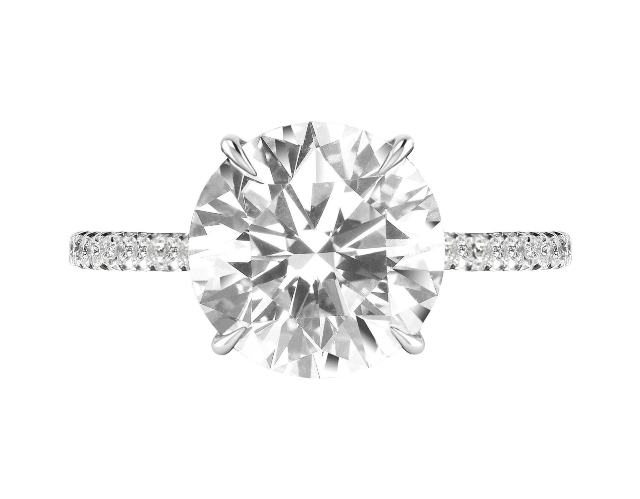 Contemporary GIA Certified 1.50 Carat Round Cut Diamond VVS2 Clarity Platinum Ring with pavè For Sale