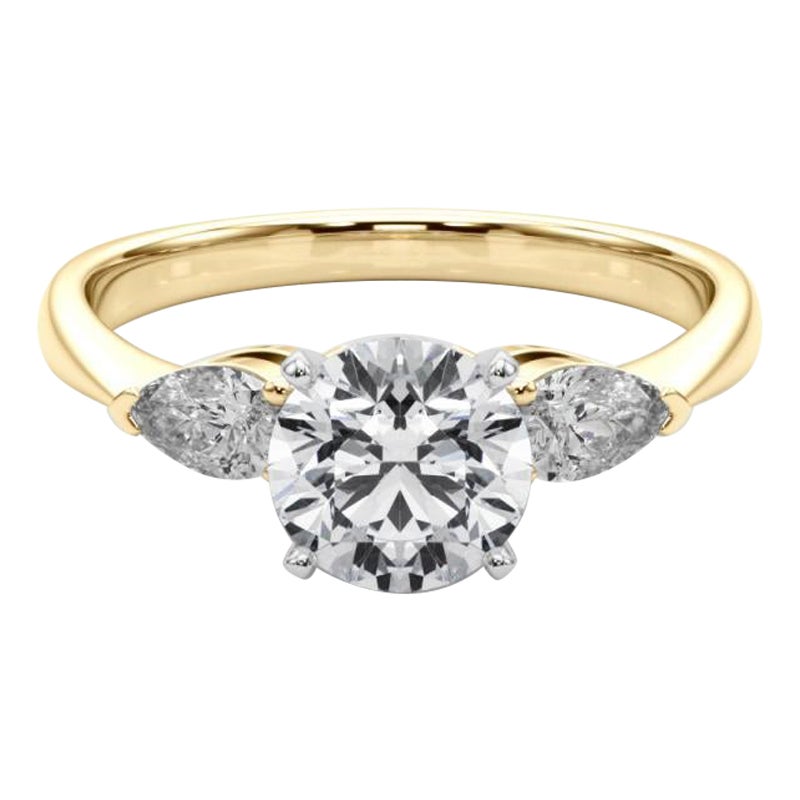Anello con tre pietre di diamante rotonde est-ovest certificato GIA da 1.51 carati