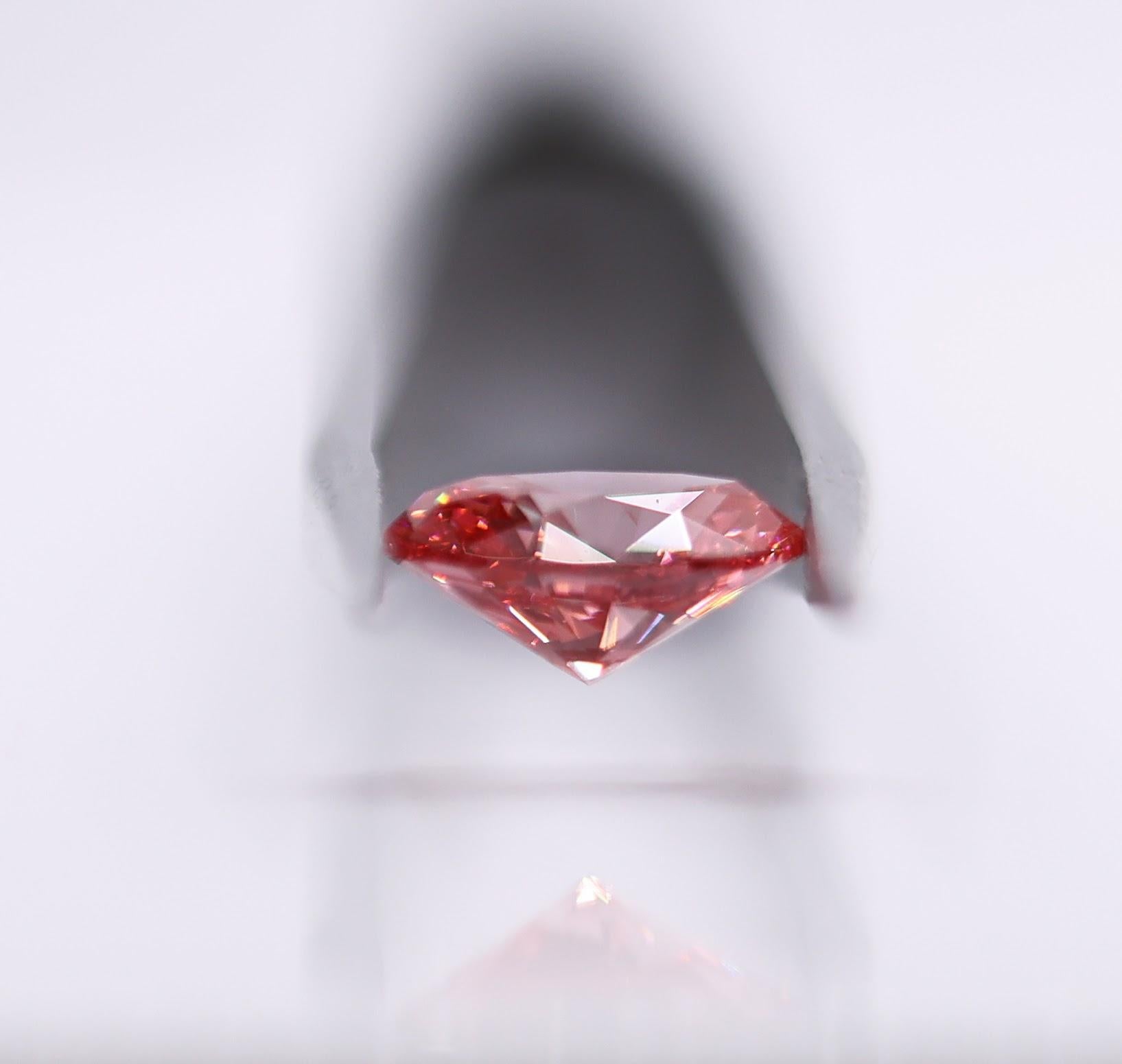 Modernist GIA Certified 1.51 Carat Vivid Earth Mined Pink Diamond Brilliant Oval Cut 8x6mm For Sale