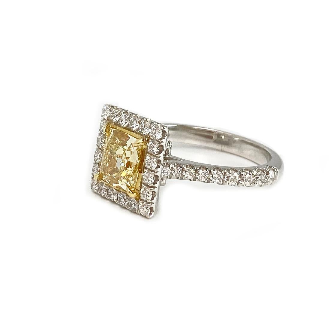 A princess cut look with a 1.51ct Cushion Cut Fancy Yellow Diamond Center that radiates canary sparkle. This ring a is a must have and the perfect gift! 

This diamond is GIA certified.