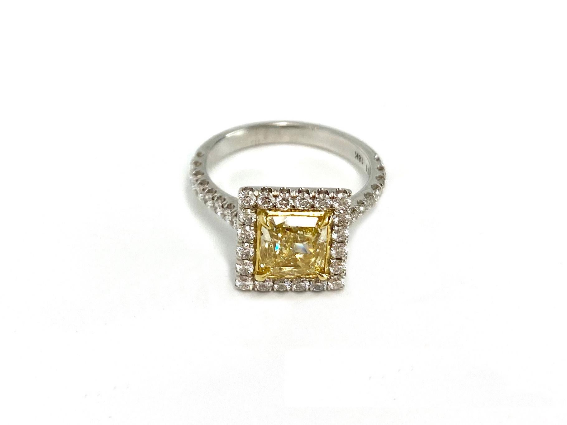 Contemporary GIA Certified 1.51 Carat Fancy Yellow Square Halo Diamond Ring For Sale
