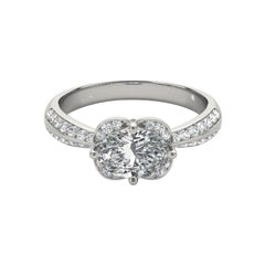 Anillo de diamantes de pavé doble con halo ovalado este-oeste de 1,52 quilates certificado por el GIA