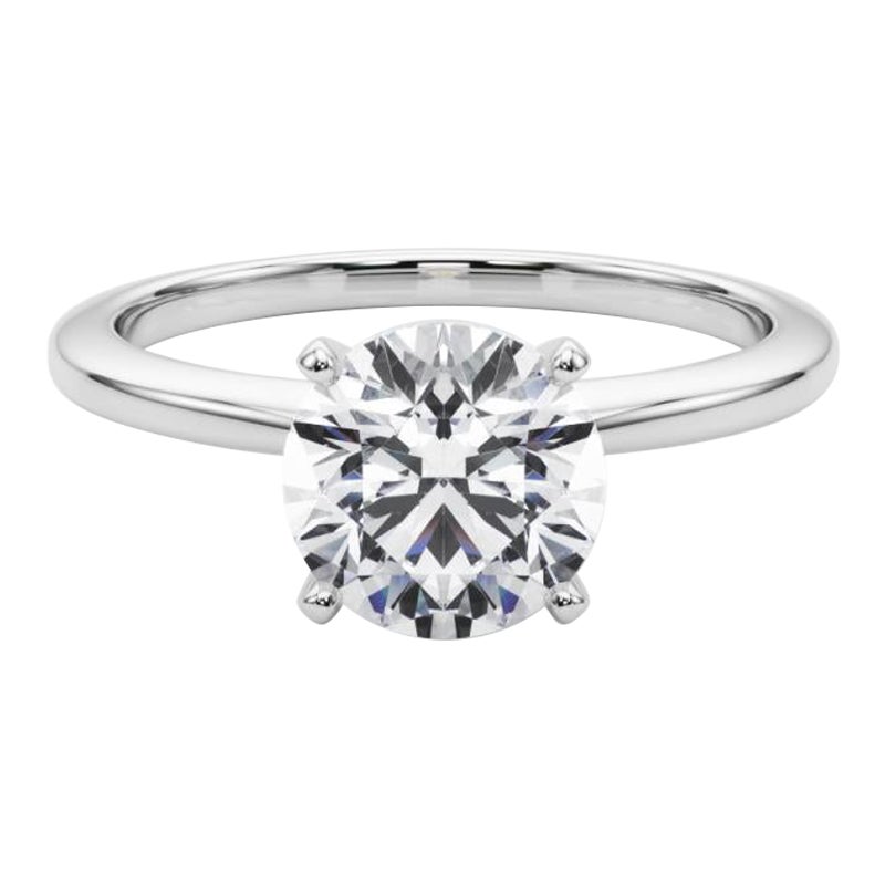 Bague en platine certifiée GIA de 1,52 carat de diamant rond solitaire serti à l'aiguille