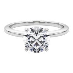Bague en platine certifiée GIA de 1,52 carat de diamant rond solitaire serti à l'aiguille