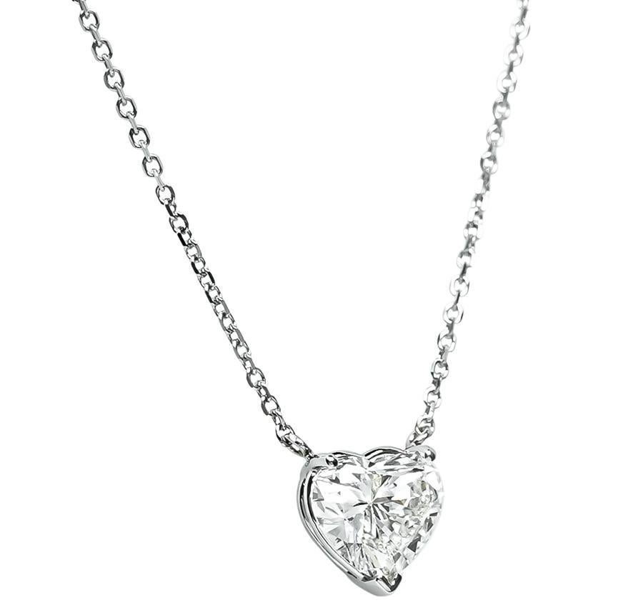 This is an elegant 14k white gold pendant necklace. The necklace is set with sparkling GIA certified heart shape diamond that weighs 1.52ct. The color of the diamond is G with VS2 clarity. The pendant measures 8mm by 8mm. The chain measures 16 1/2