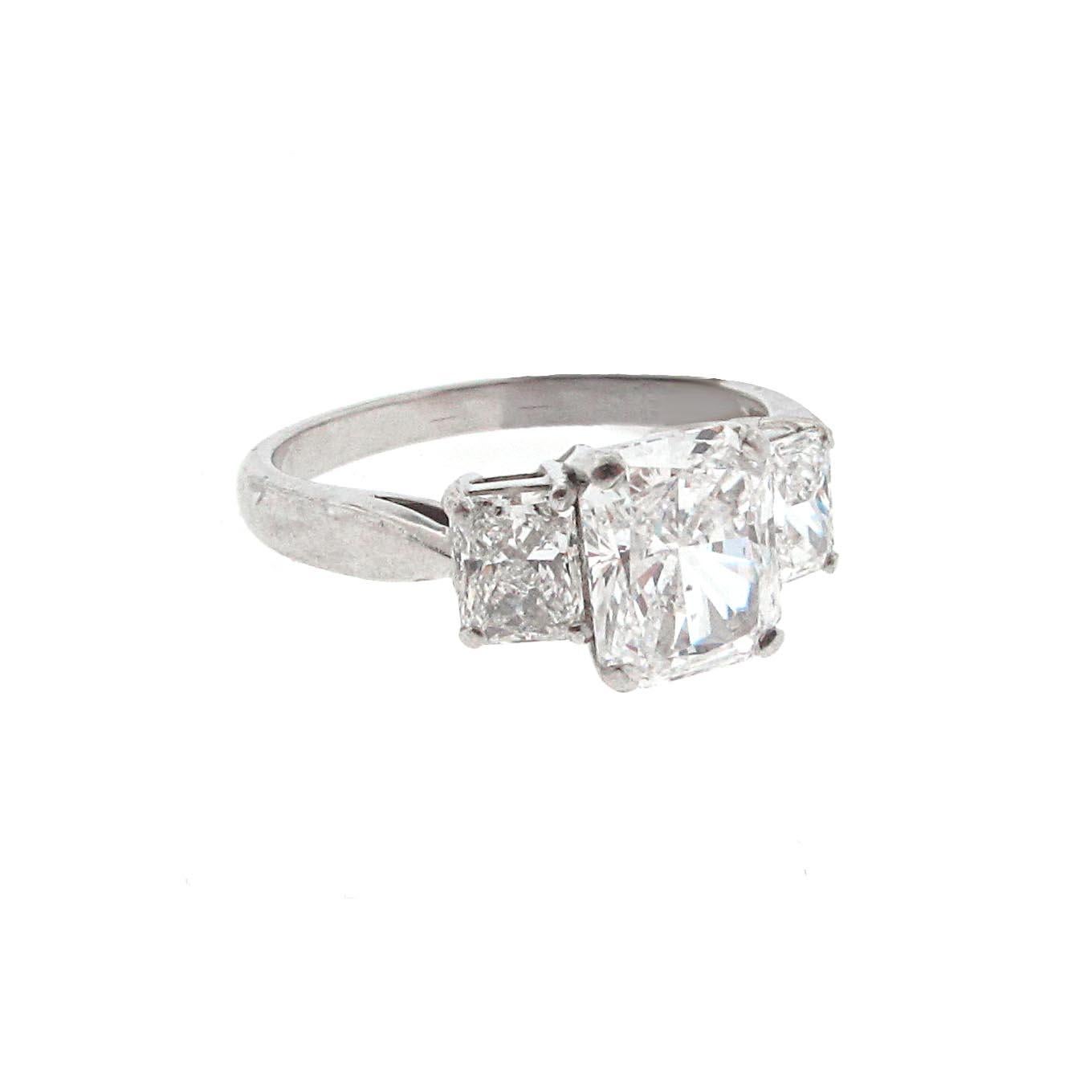 Modern GIA Certified, 1.53 carat E-Si1 Radiant Diamond Three-Stone Engagement Ring