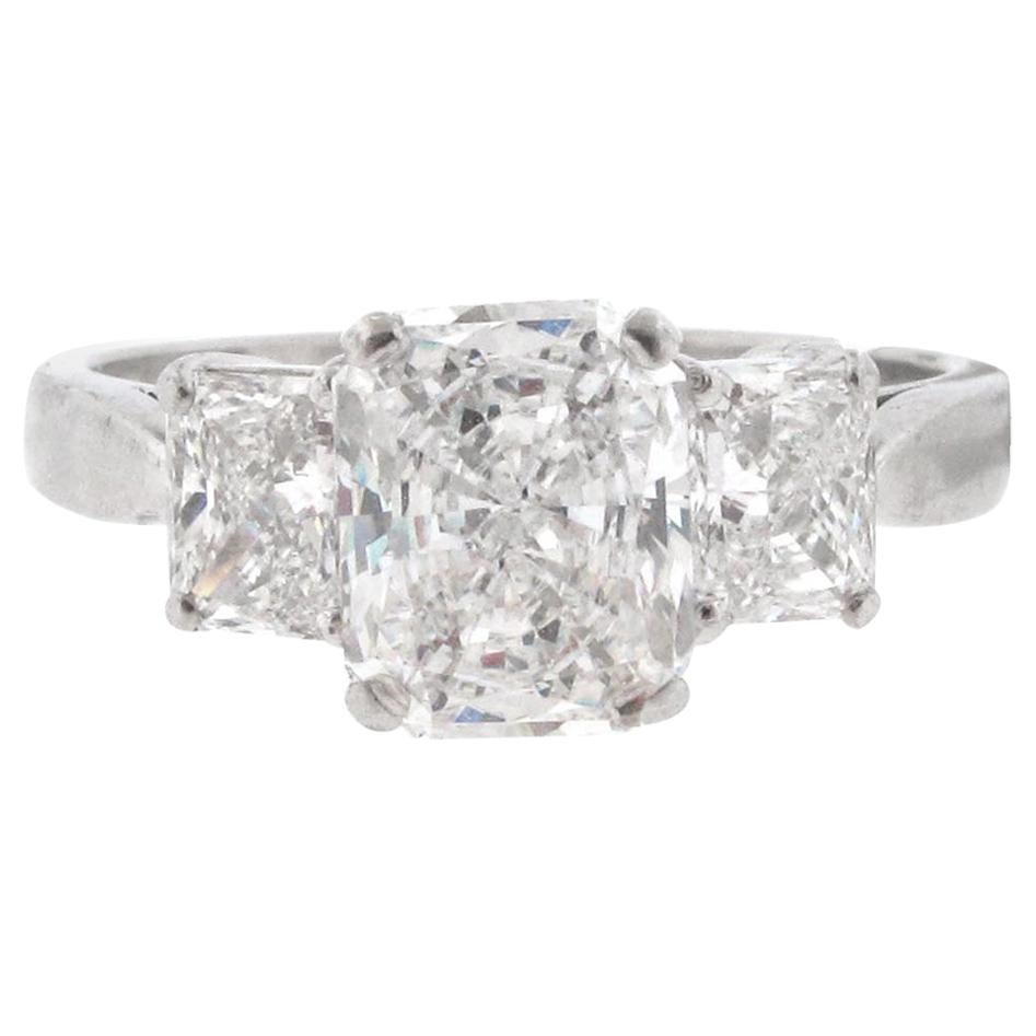 GIA Certified, 1.53 carat E-Si1 Radiant Diamond Three-Stone Engagement Ring