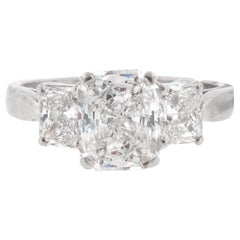 GIA Certified, 1.53 carat E-Si1 Radiant Diamond Three-Stone Engagement Ring