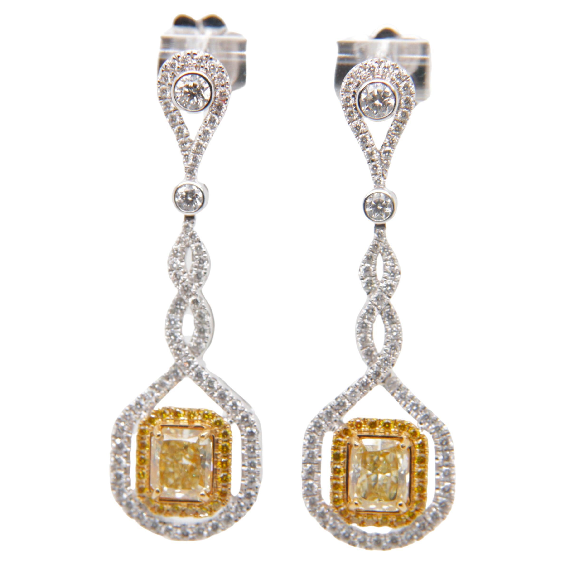 GIA Certified 1.53 carat Fancy Yellow Diamond Braided Dangle Earrings in Gold For Sale