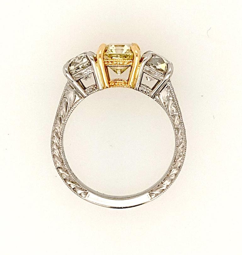 yellow diamond 3 stone ring