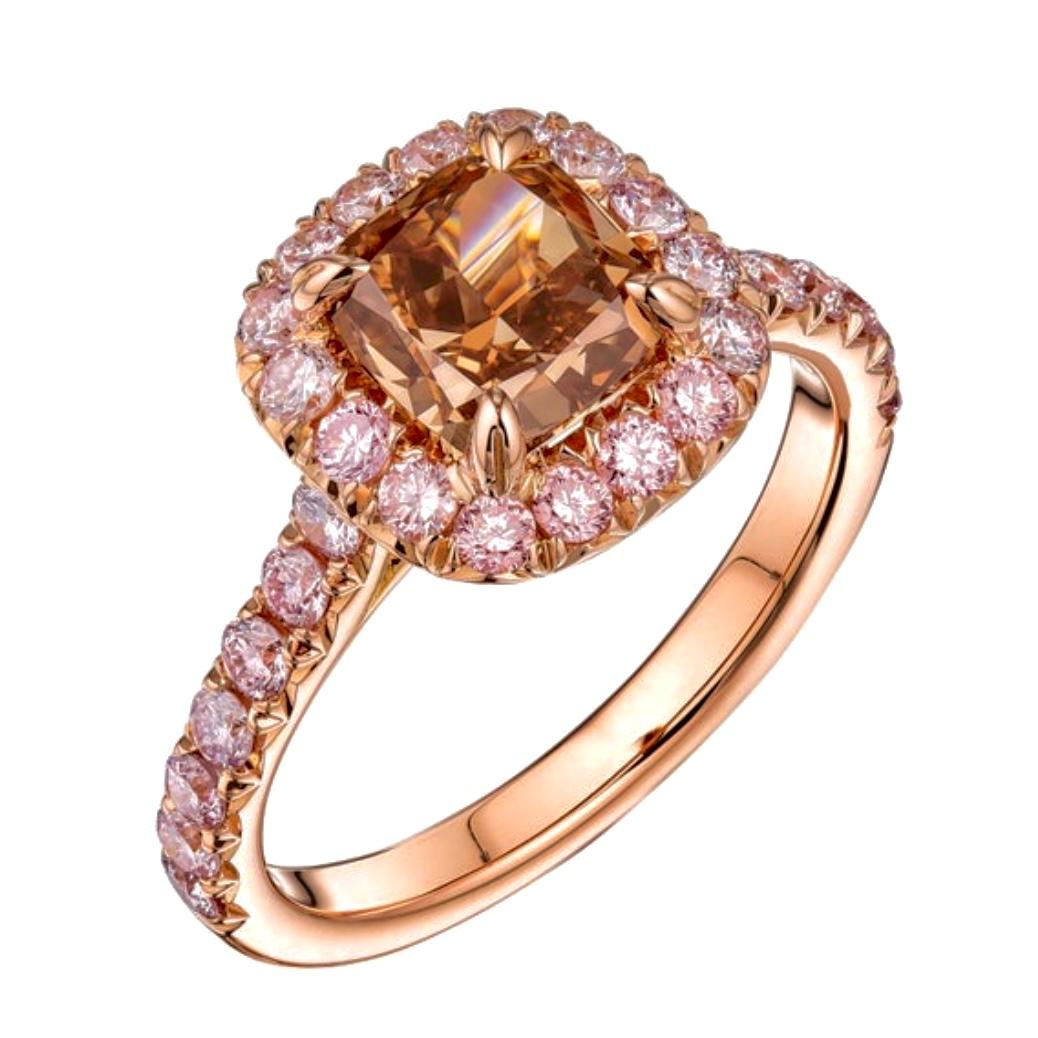 Natural Diamond ring with GIA certificate, NO. 12145530073. Center stone: 1.54 ct cushion cut fancy yellow-brown SI1 diamond, 6.53 x 6.20 x 4.15 mm. Side stones: .70ct, 30 Brilliant round, fancy light pink VS2- SI1. All set in 18K rose gold. Total