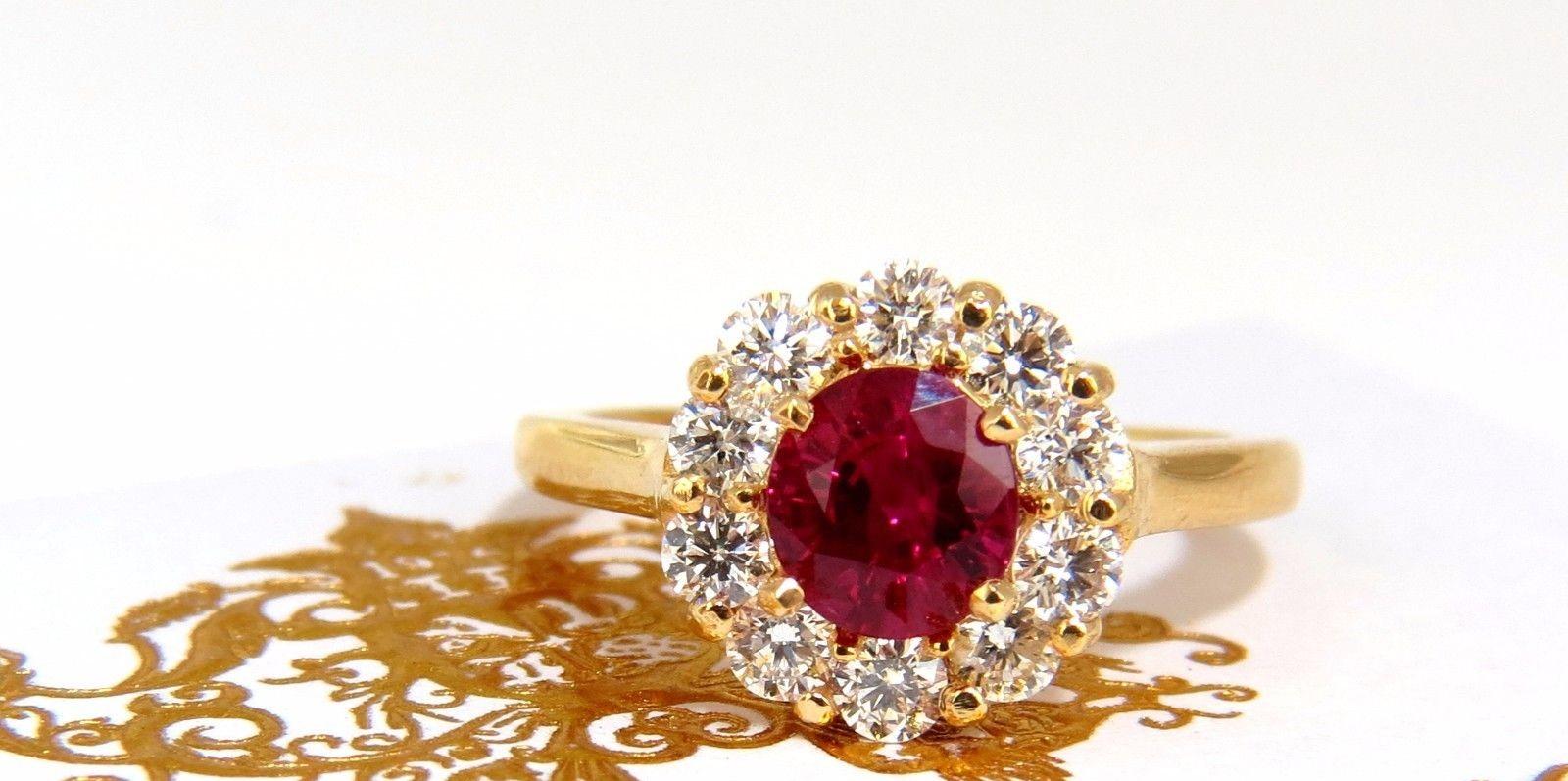 GIA Certified 1.54 Carat Oval Cut Red Ruby .88 Carat Diamonds Ring 18 Karat In New Condition For Sale In New York, NY