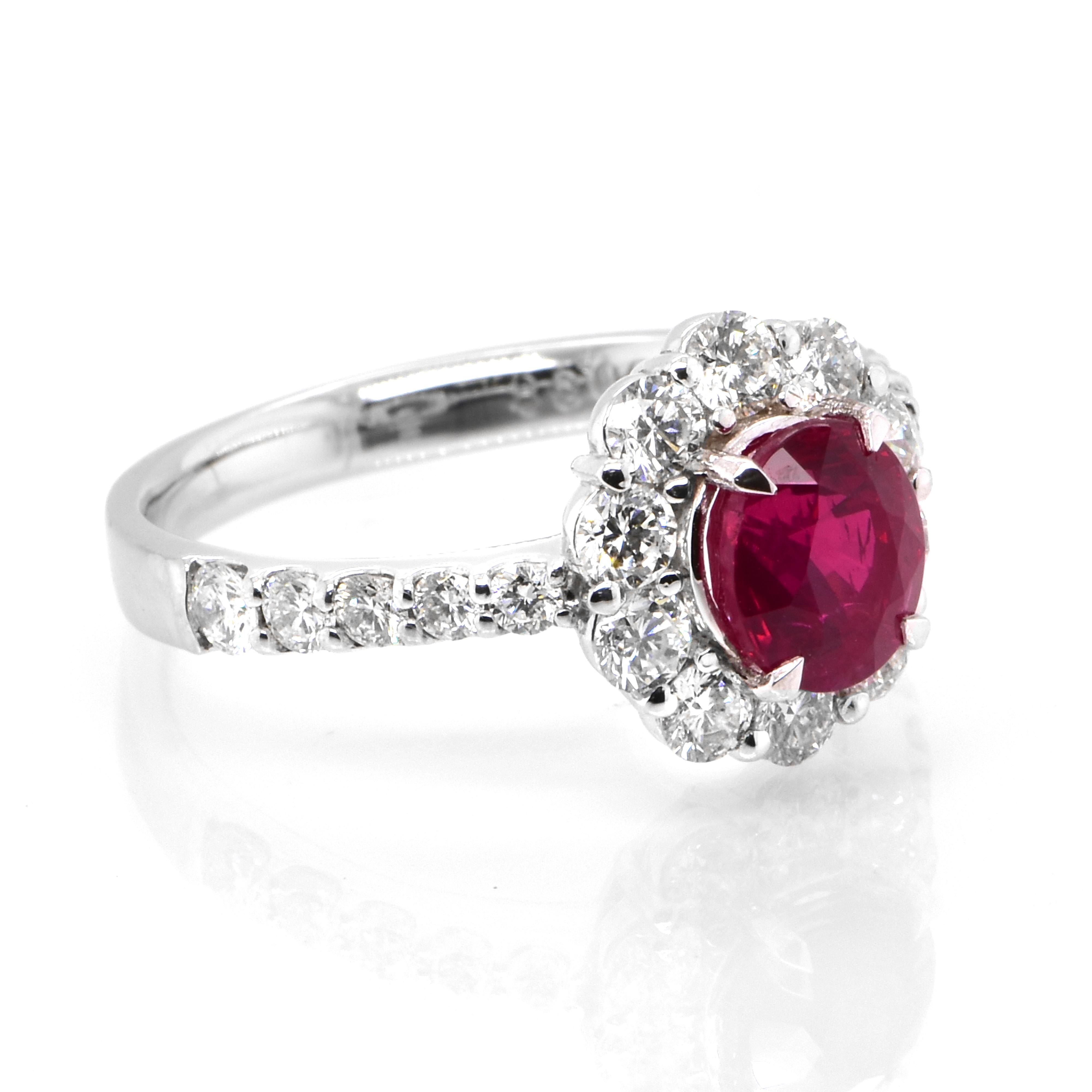 A beautiful Ring set in Platinum featuring a GIA Certified 1.54 Carat Natural Mozambican, Untreated (No Heat) Ruby and 0.98 Carat Diamonds. Rubies are referred to as 