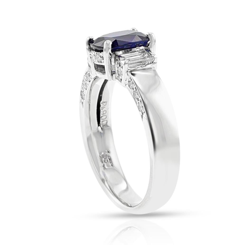 A GIA Certified 1.54 ct. Unheated Burma Sapphire Ring with Diamonds, Platinum. The diamonds weigh 0.57 carats. The total weight of the ring is 8.35 grams. The ring size is US 6.50. 
