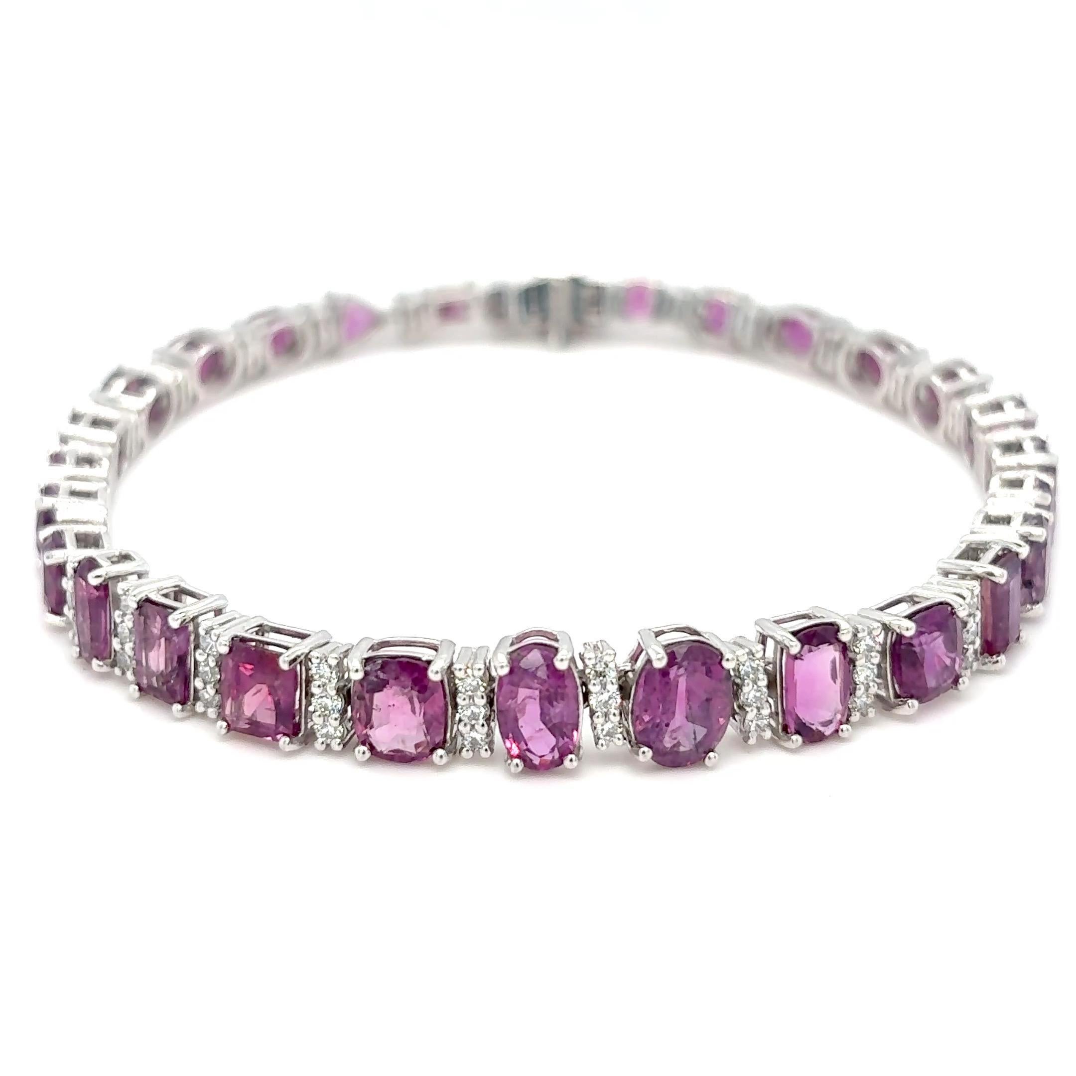 GIA-Certified 15.45 Carat Unheated Kashmir Sapphire & Diamond Bracelet
This exquisite bracelet showcases a rare 15.45 carat unheated Kashmir purple-pink sapphire, certified by GIA. Set in elegant platinum, it is beautifully accented by 0.81 carats
