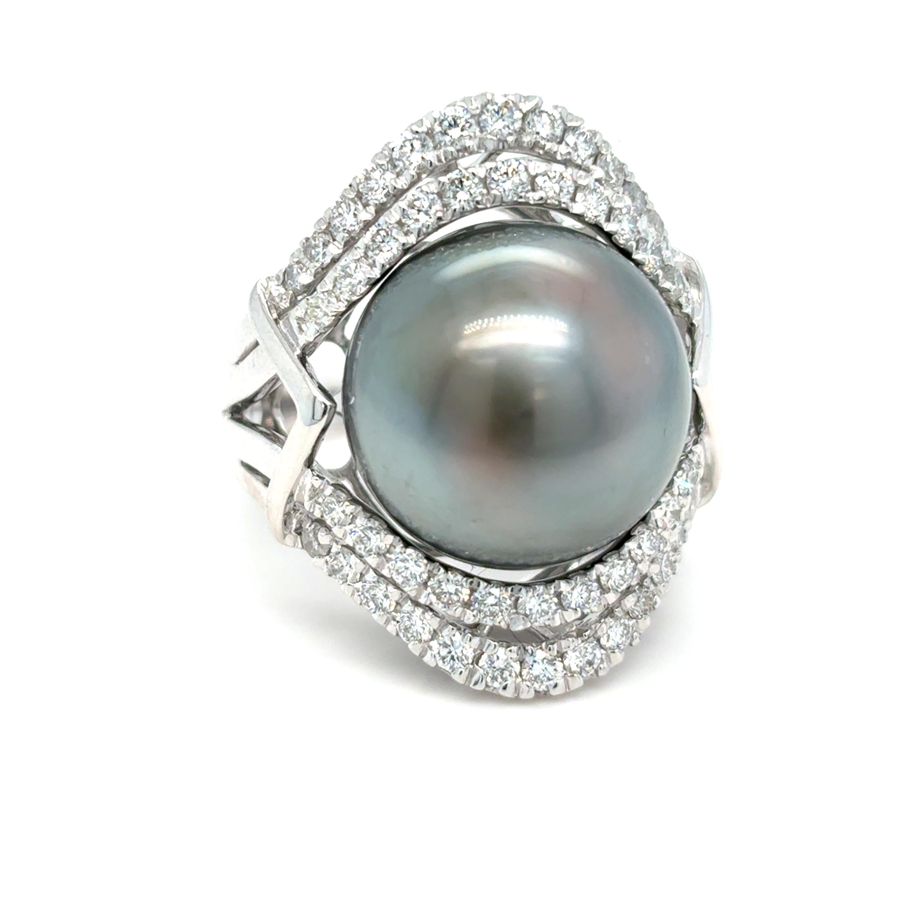 GIA Certified Tahitian Pearl & Diamond Platinum Ring 
A true showstopper, this exquisite GIA Certified Tahitian pearl ring features a captivating 24.99-carat pearl measuring 15.45 x 15.11 mm. The pearl boasts a rich luster with enchanting greenish
