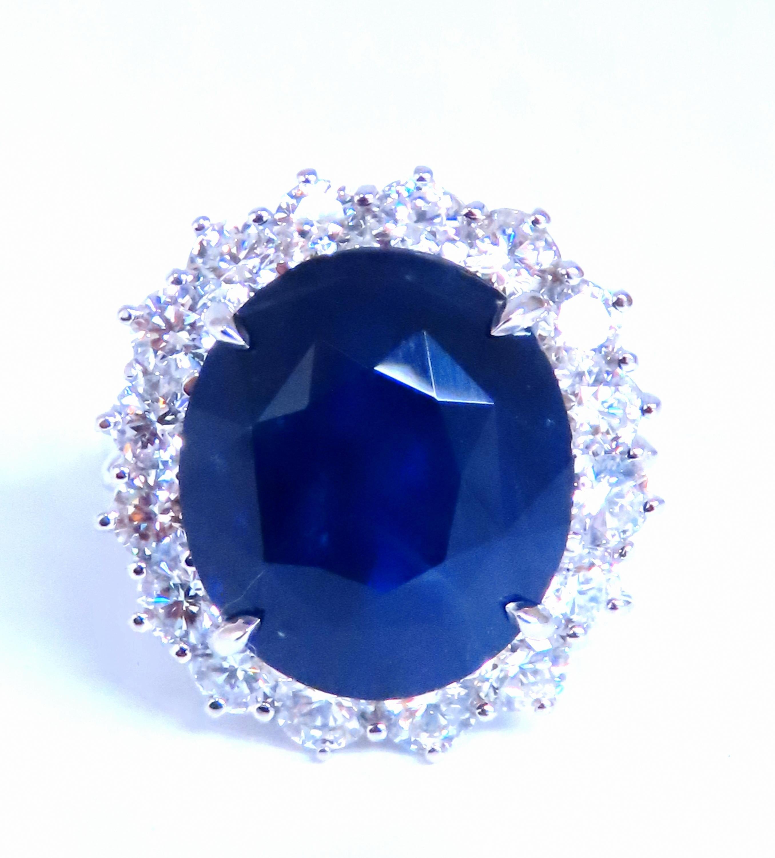 GIA Certified Natural 15.49ct Natural Sapphire Diamond Ring
Report # 5212639955
Stating Heated & Transparent Blue
15.2 x 13.3 x 9.3mm

Side Natural Diamonds 2.40ct.
Rounds Full Cut G-color Vs-2 clarity.

Deck Of Ring: 20 x 19mm
Depth: 11mm
Size