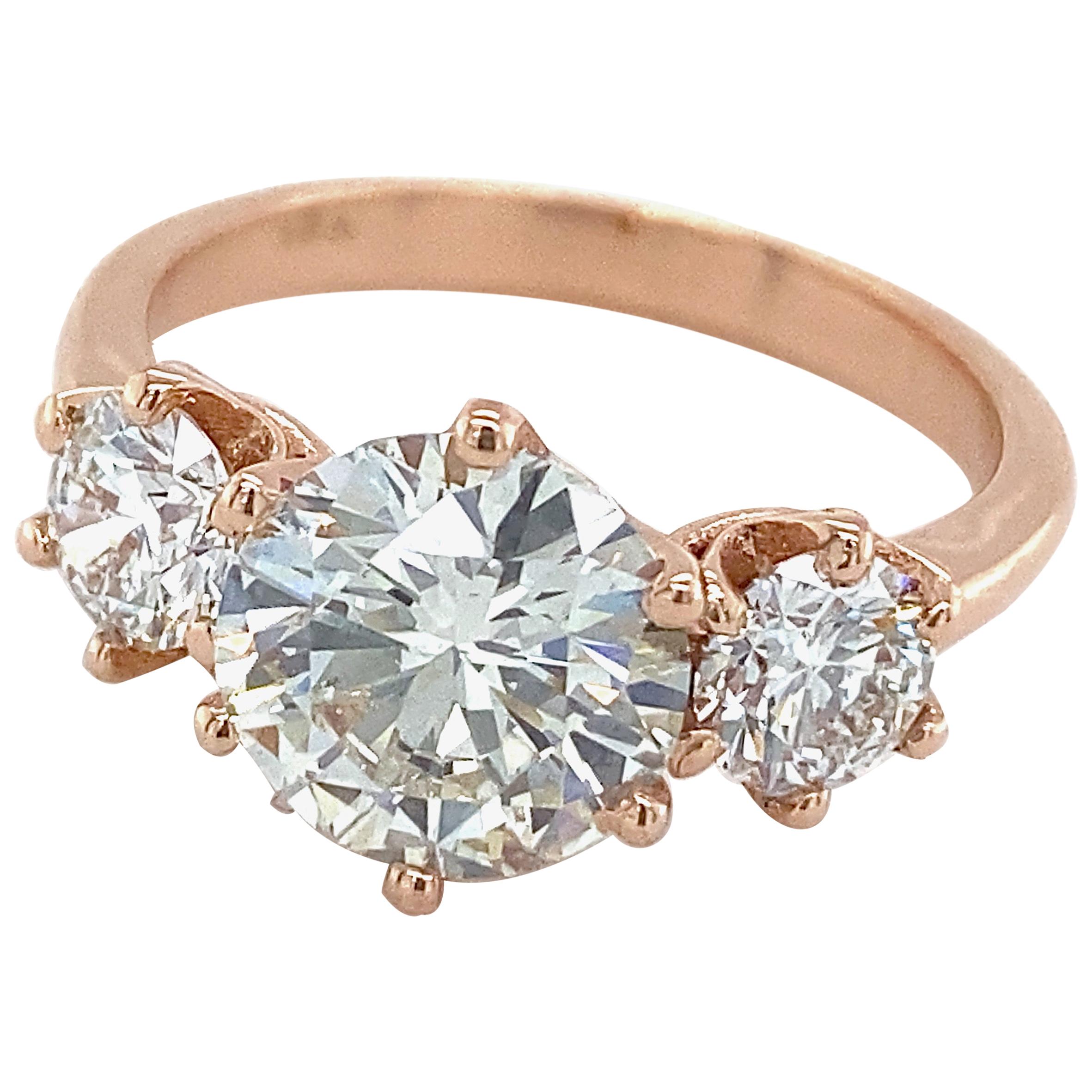 GIA Certified 1.55 Carat Diamond in Rose Gold Three-Stone Engagement Ring For Sale
