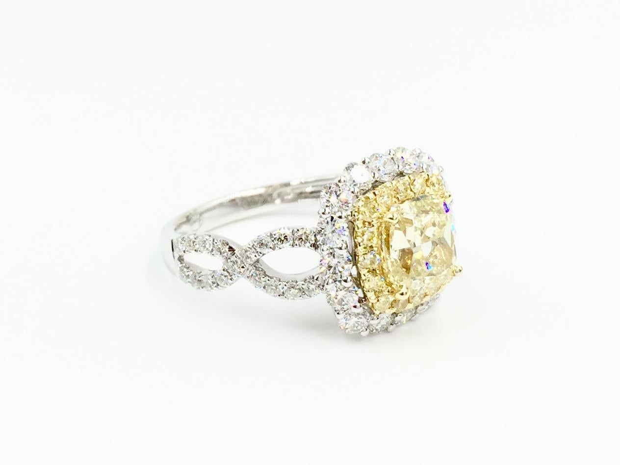 Modern GIA Certified 1.55 Carat Natural Fancy Yellow Diamond Halo Ring