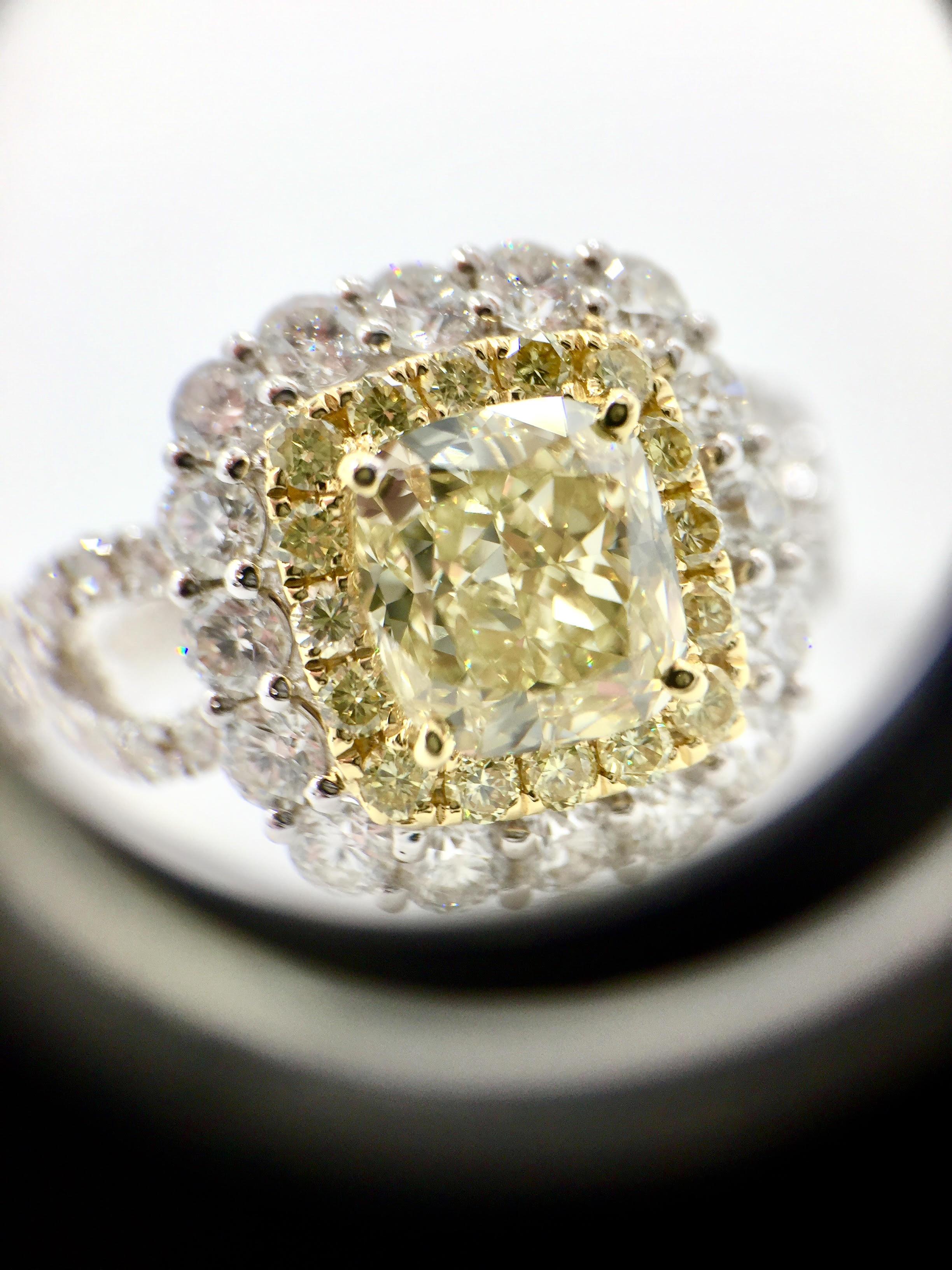 Cushion Cut GIA Certified 1.55 Carat Natural Fancy Yellow Diamond Halo Ring