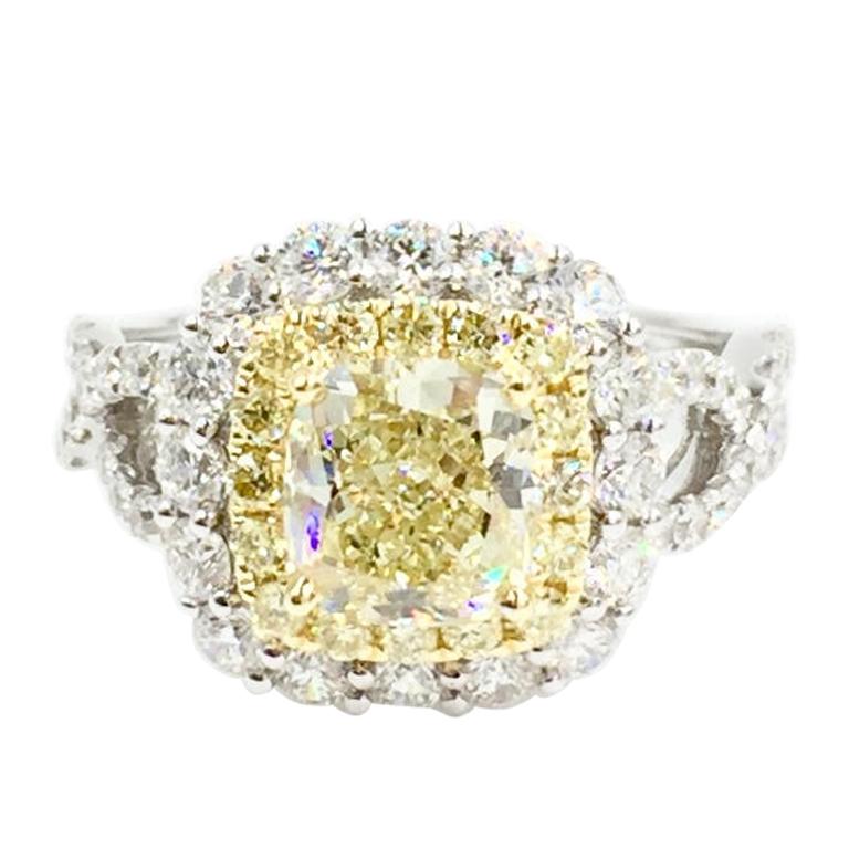 GIA Certified 1.55 Carat Natural Fancy Yellow Diamond Halo Ring