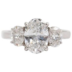 oval engagement ring with side stones GIA Certified 1.55 Carat Oval Diamond Ring with Oval Side Stones