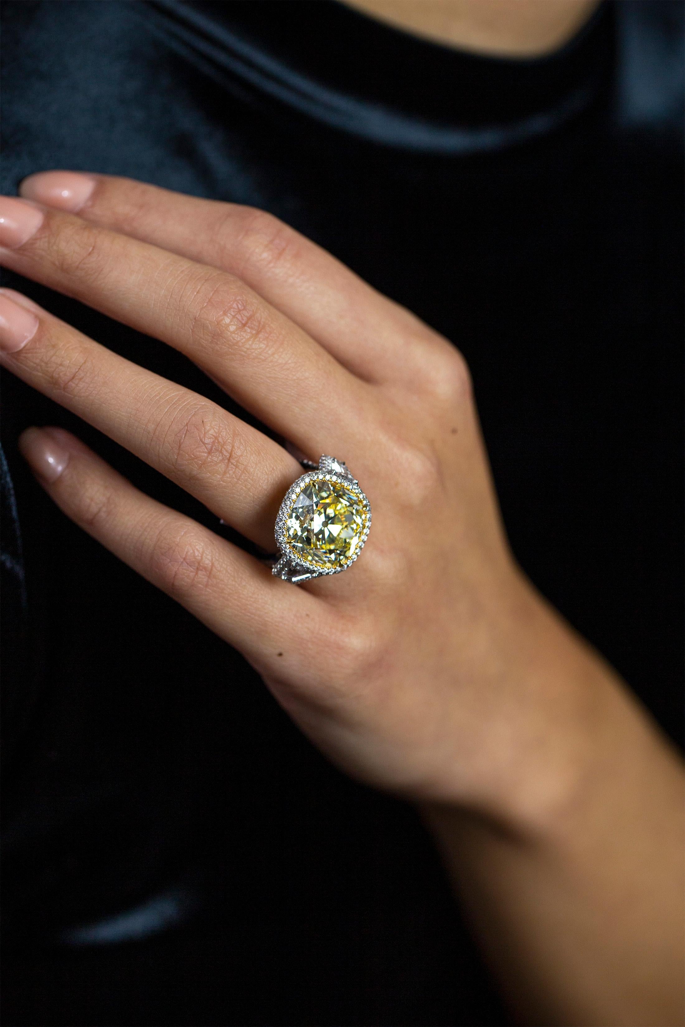 GIA Certified 15.52 Carat Fancy Yellow Diamond Three-Stone Halo Engagement Ring In New Condition For Sale In New York, NY