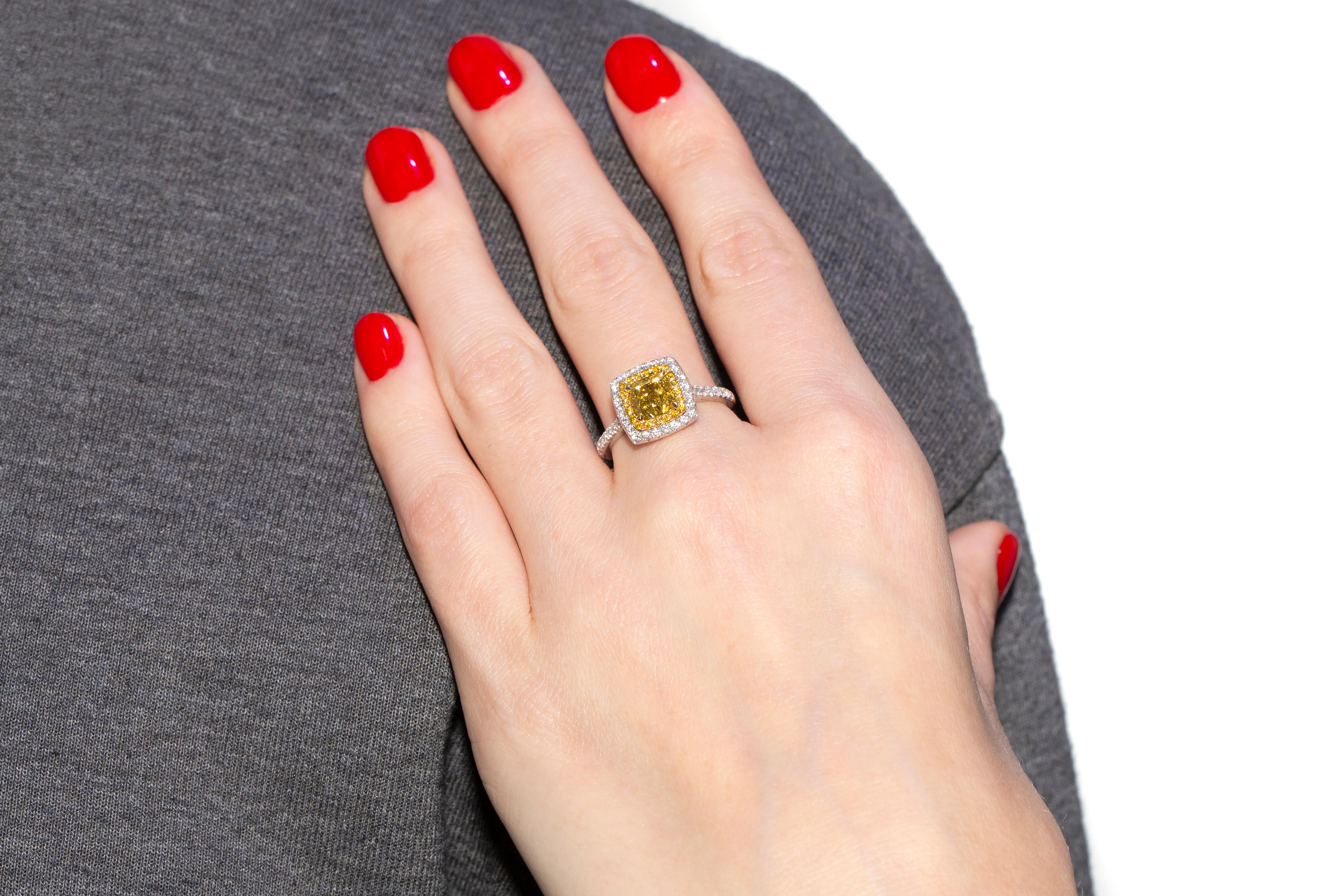 Modern GIA Certified 1.56 Carat Yellow Diamond 18 Karat White Gold Ring For Sale