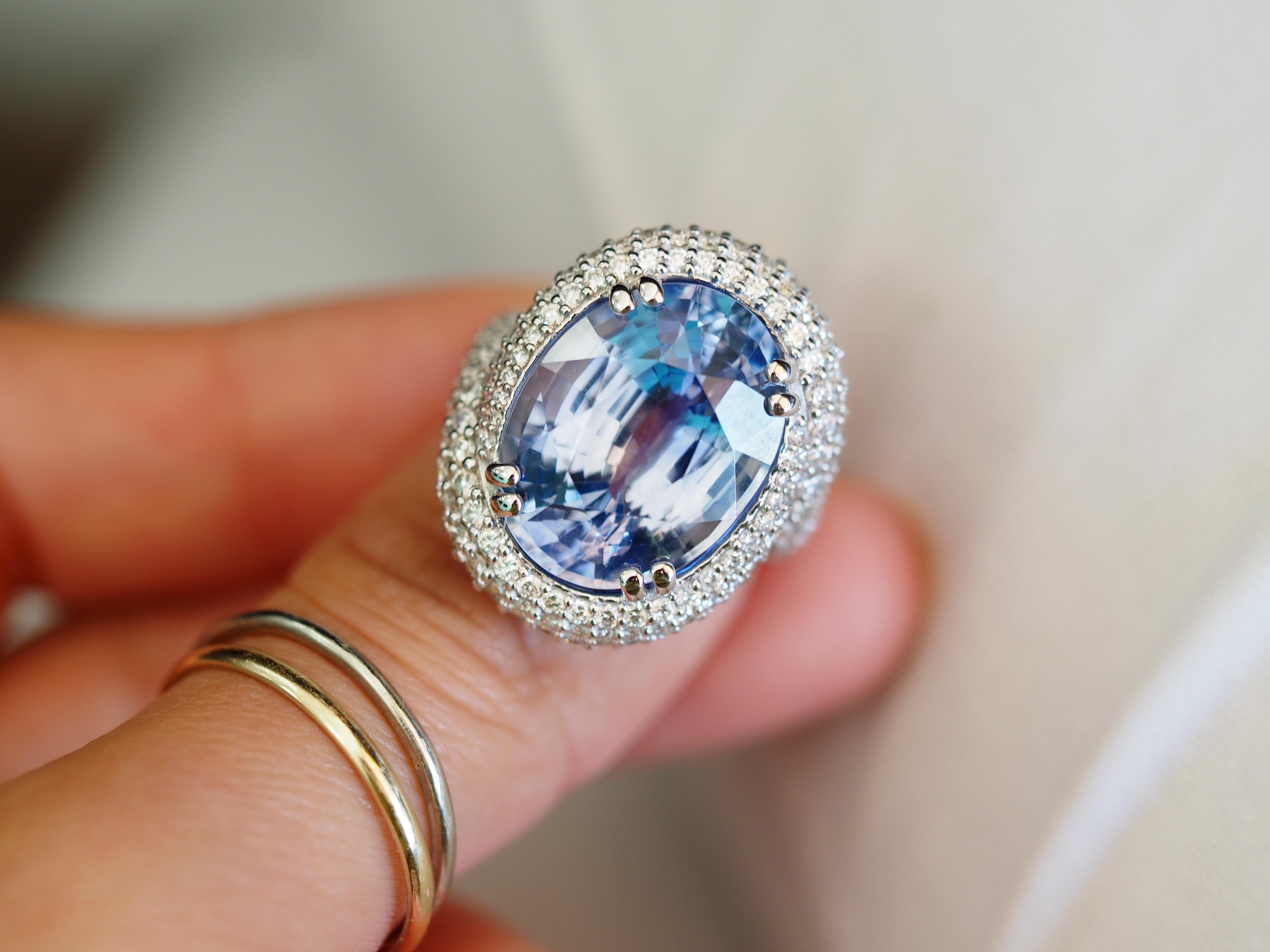 This incredible GIA Certified Ceylon sapphire ring  is a one of a kind piece created at Dr. Gold Jewelry and Diamonds. The center oval cut Sapphire weighs  15.67 carats and measures 16.69 x 12.71 x 9.04 mm. The sapphire color is a bright bold