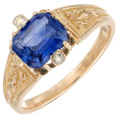 Anillo de compromiso de oro con zafiro octogonal azul certificado por GIA de 1,57 quilates y diamante