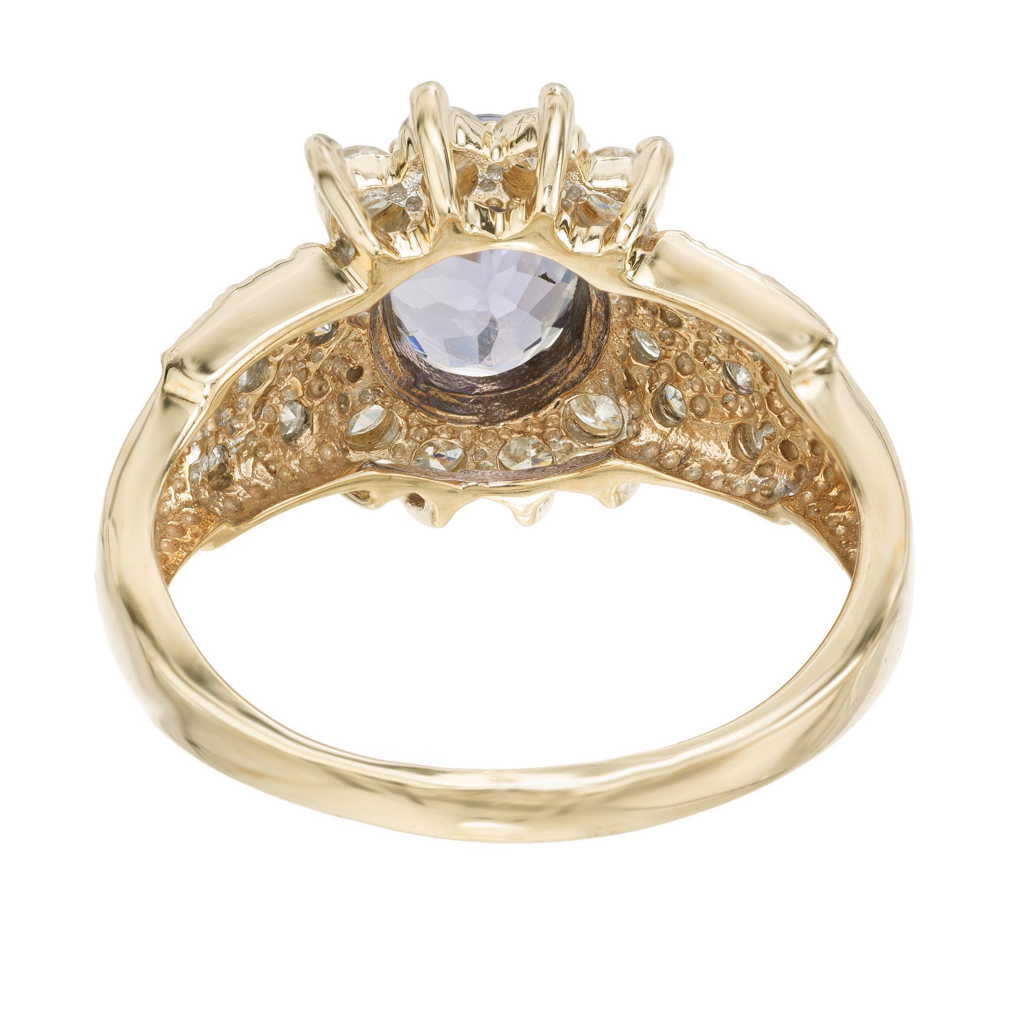 Bague de fiançailles en or avec tanzanite ovale de 1,57 carat et diamants certifiés GIA en vente 2