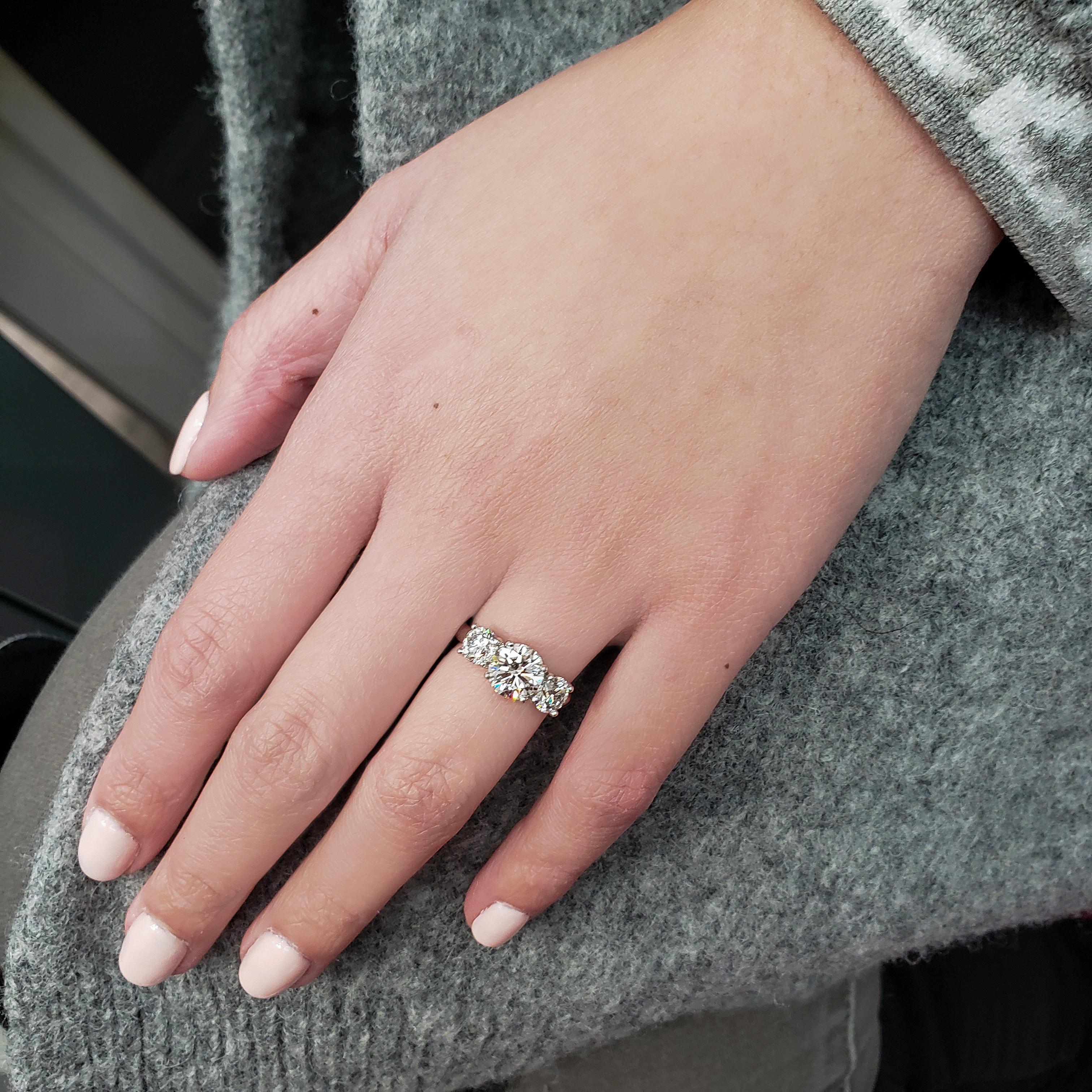 Contemporary GIA Certified 1.58 Carat Round Diamond Three-Stone Engagement Ring