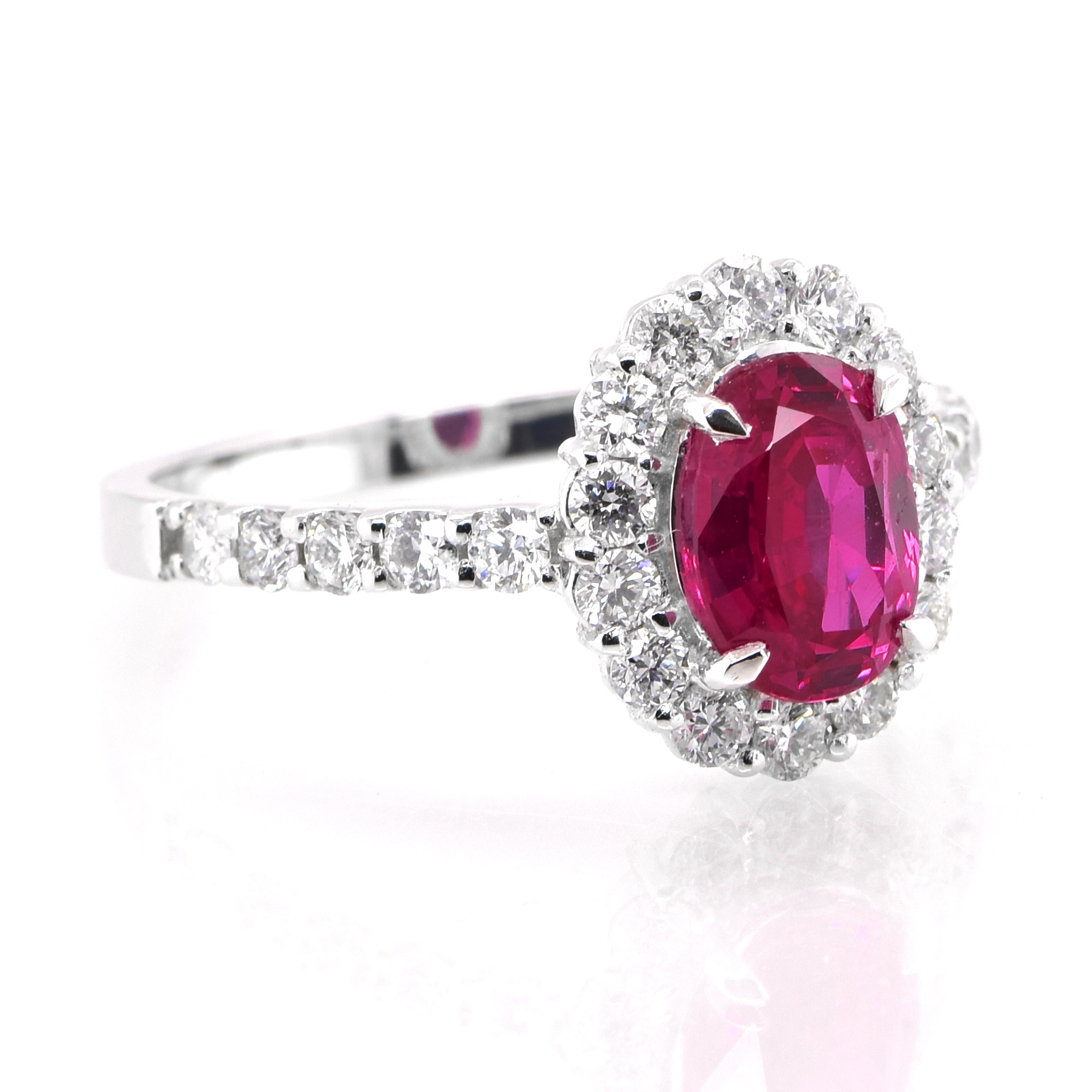 A beautiful Ring set in Platinum featuring a GIA Certified 1.58 Carat Natural Burmese, Untreated (Unheated) Ruby and 0.62 Carat Diamonds. Rubies are referred to as 