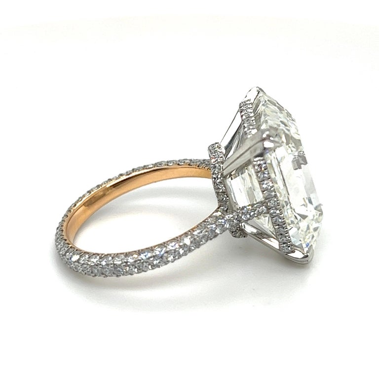 Magnificent 15.87 carat emerald-cut diamond solitaire engagement ring.
Classic solitaire ring centering upon a stunning emerald-cut diamond of 15.87 carats, I / VVS2. The ring mount and the shank are crafted in 950 platinum and decorated with