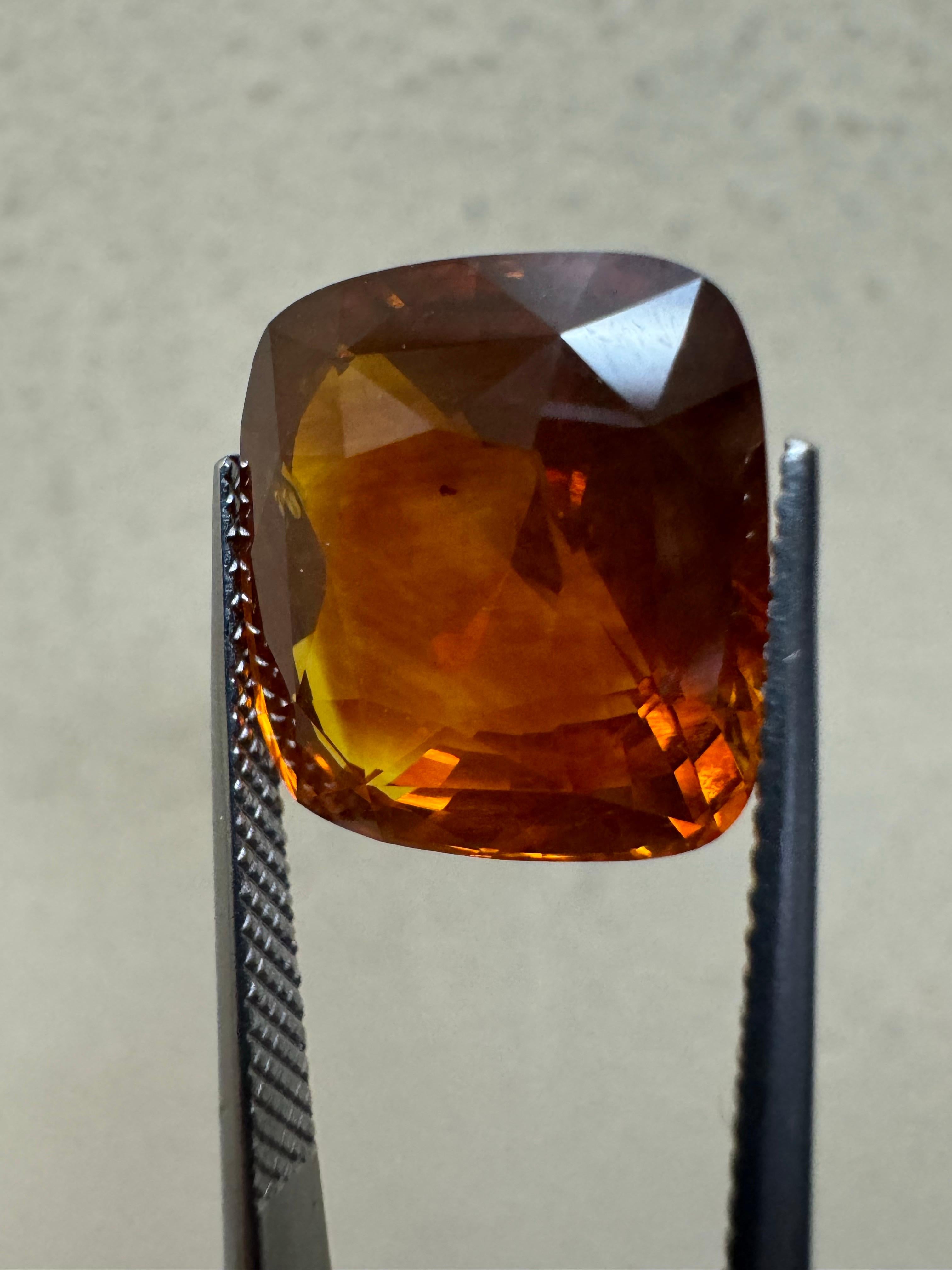 da uomo o donna GIA Certified 15.89 Carat Cushion Cut Orange Sapphire in vendita