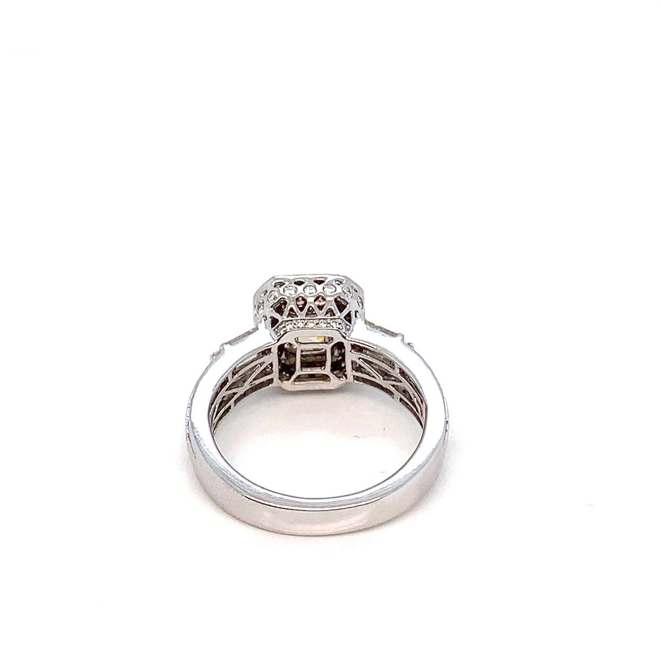 Introducing a masterpiece by Rewa Jewelry, a harmonious blend of art deco opulence and contemporary allure. This exceptional diamond ring is a true embodiment of timeless elegance with a modern twist.

At the heart of this captivating piece lies a